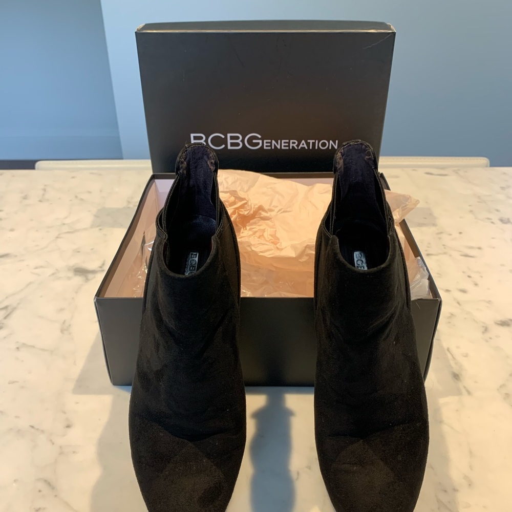 BCBGeneration, Black Bootie, almond closed toe, wrap around 3” heel pull on boot
